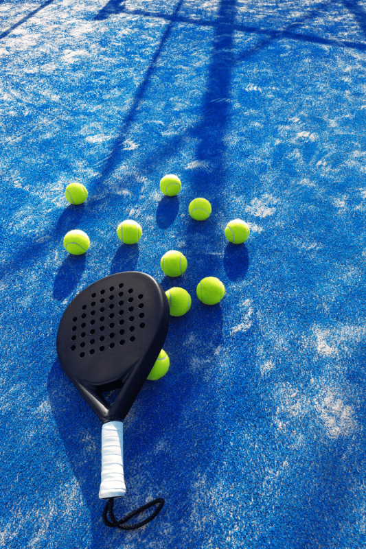padel tennis racket and balls